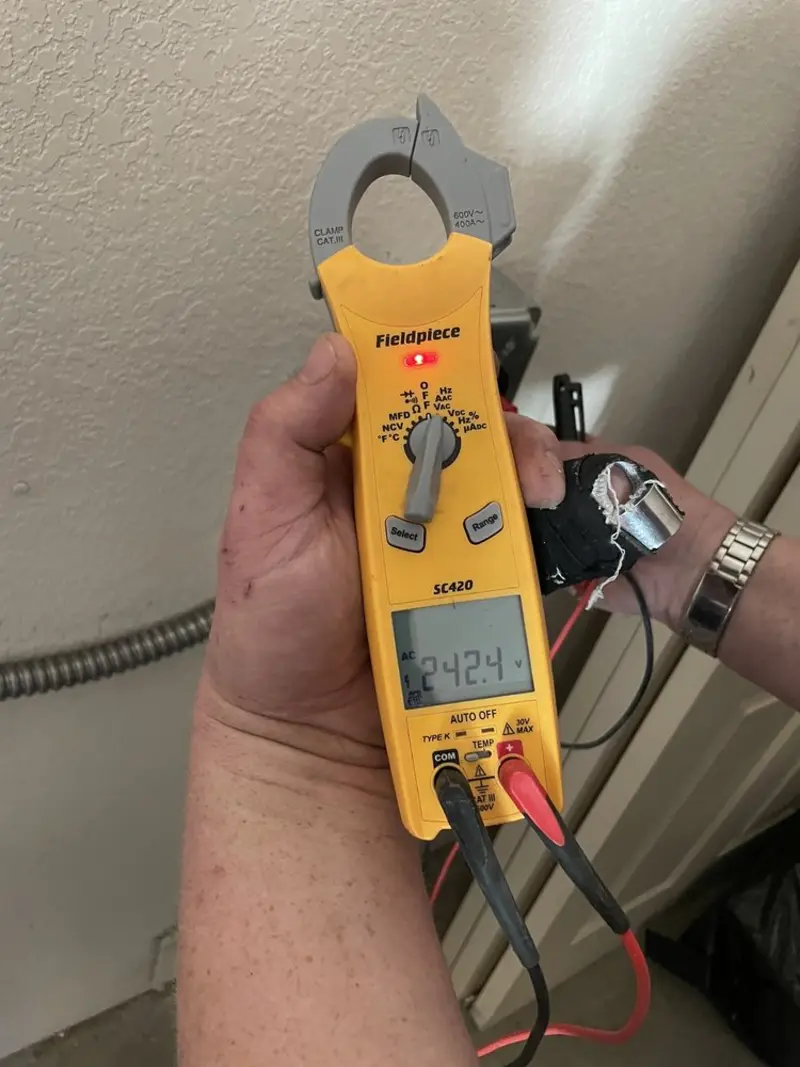 Voltage testing with clamp meter during Generator Installation in Shady Hills